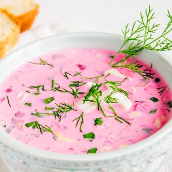 Cold soup with vegetables and herbs in bowl
